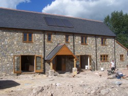 Helland, Somerset. Rebuild of old farmhouse. Using new and existing stone.